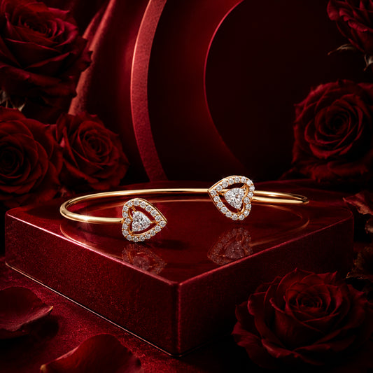 Luxury diamond cuff bracelet with heart motifs on ruby red editorial set