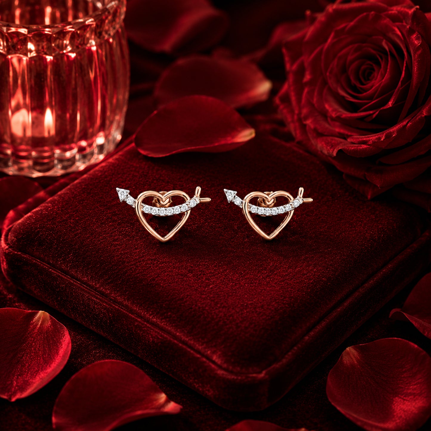 Cupid heart diamond earrings in rose gold on red velvet box, luxury Firefly Diamonds jewellery campaign.