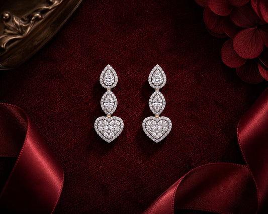 Heart-shaped ruby and diamond open ring in white gold on romantic burgundy velvet jewellery display