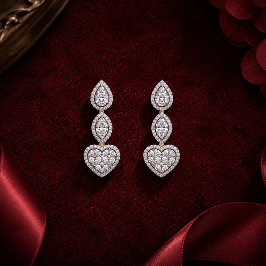 Heart-shaped ruby and diamond open ring in white gold on romantic burgundy velvet jewellery display