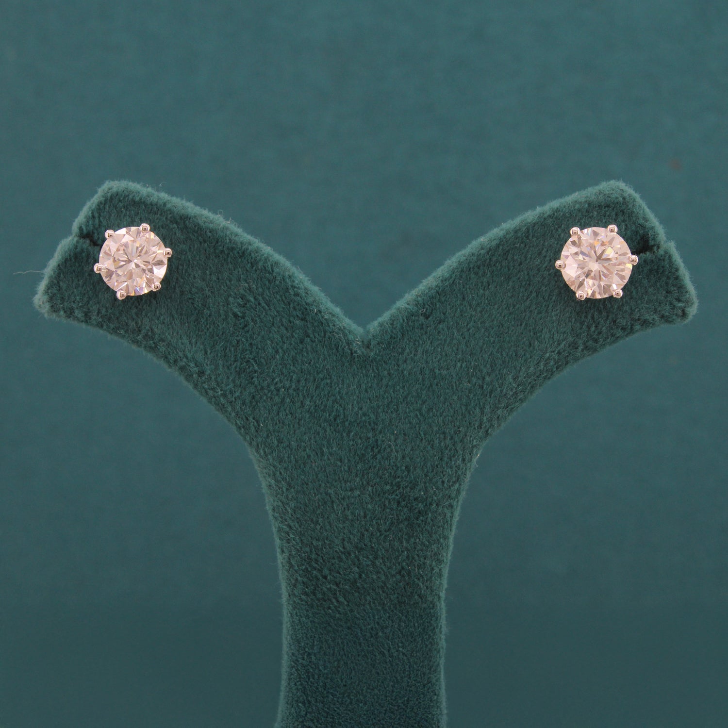 Elara Poise Diamond Solitaire Earrings