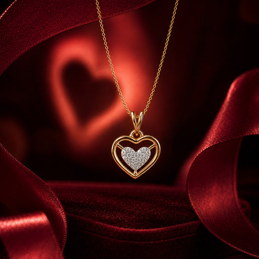 Gold heart diamond pendant necklace with floating chain on luxury red backdrop.
