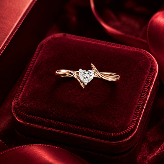 Twisted heart diamond ring in rose gold luxury Valentine jewellery shot.