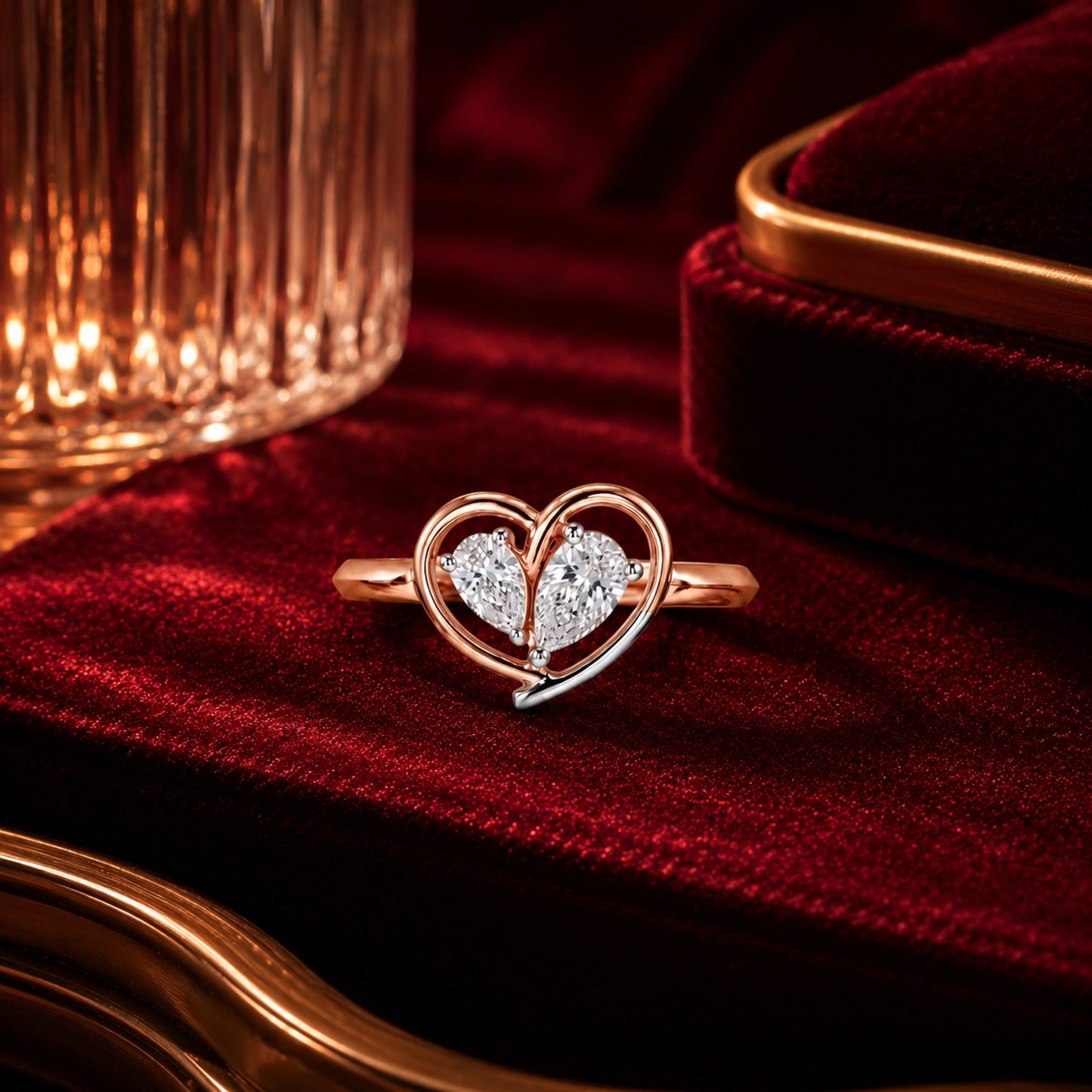 Heart-shaped lab-grown diamond ring in rose gold on crimson velvet, luxury romantic jewellery photography by Firefly Diamonds.