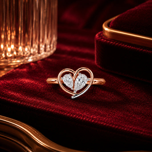 Heart-shaped lab-grown diamond ring in rose gold on crimson velvet, luxury romantic jewellery photography by Firefly Diamonds.