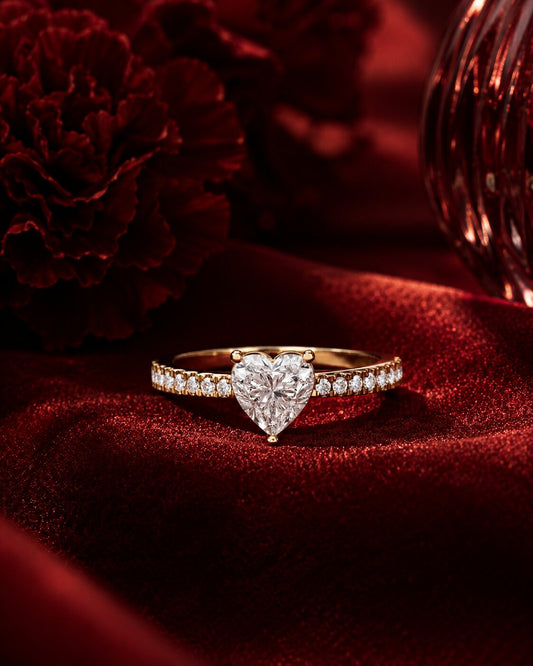 Heart solitaire diamond ring in yellow gold with romantic red velvet styling